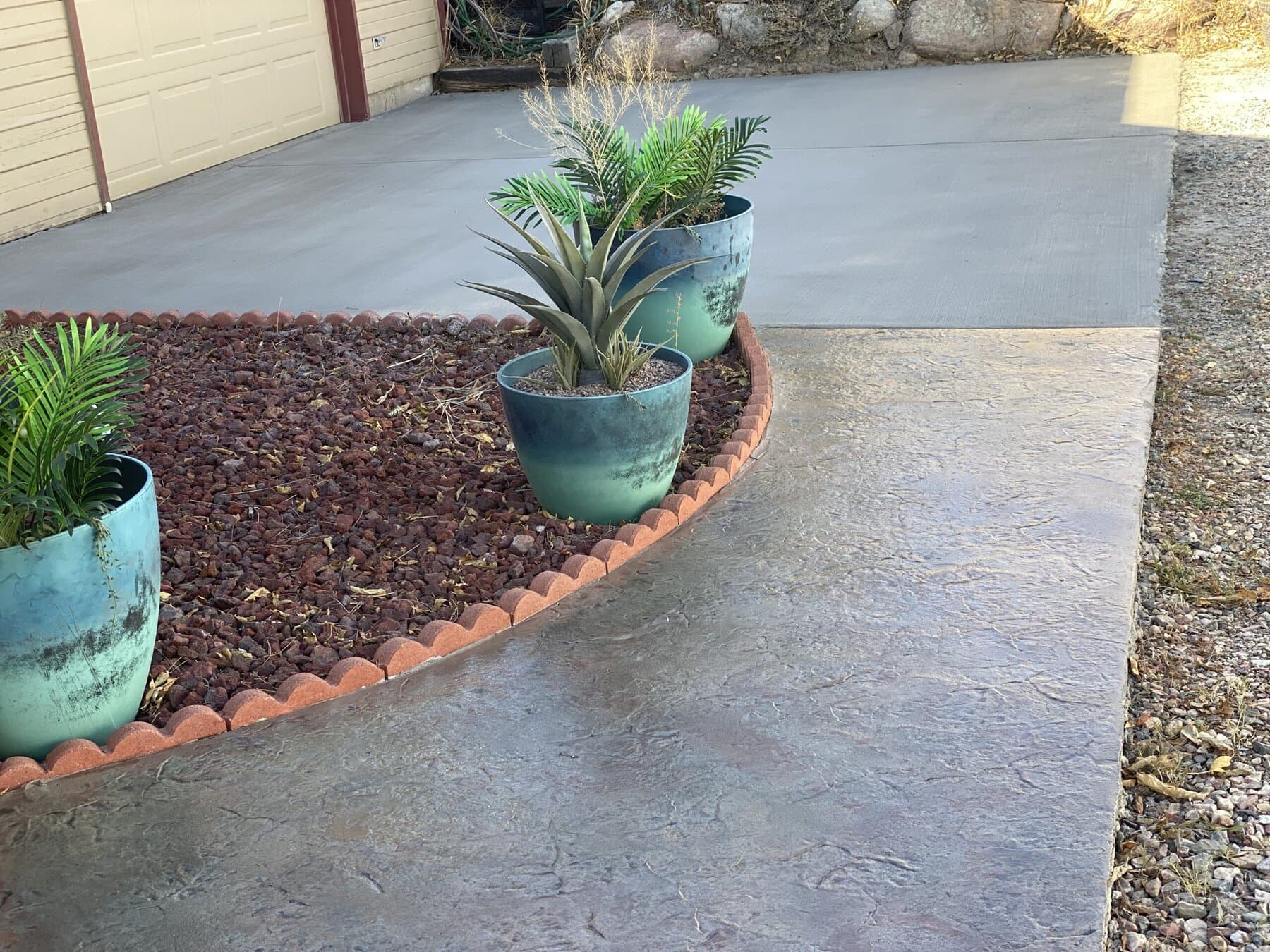 Driveway with a dark stamped border