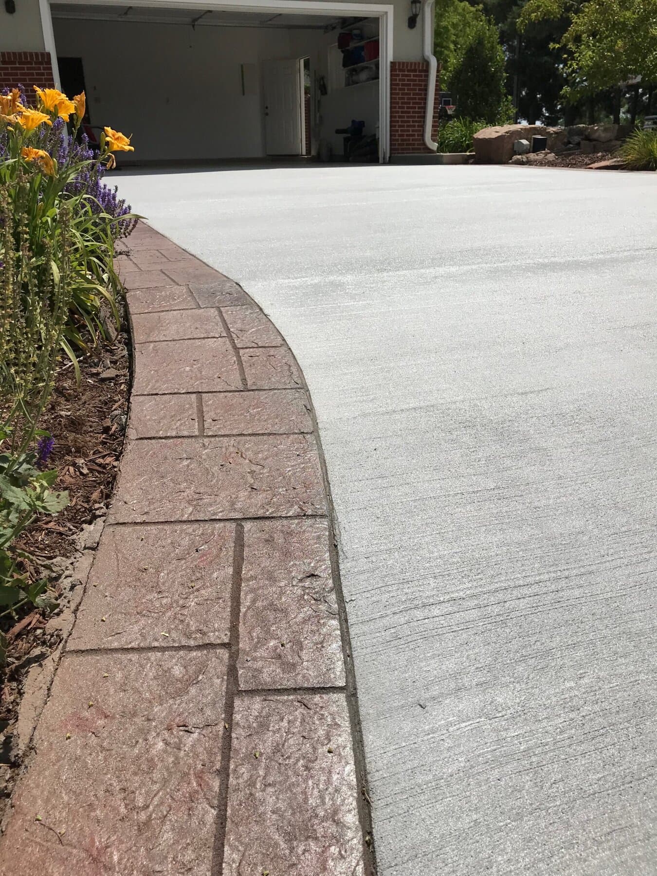 Driveway with a brick-pattern border