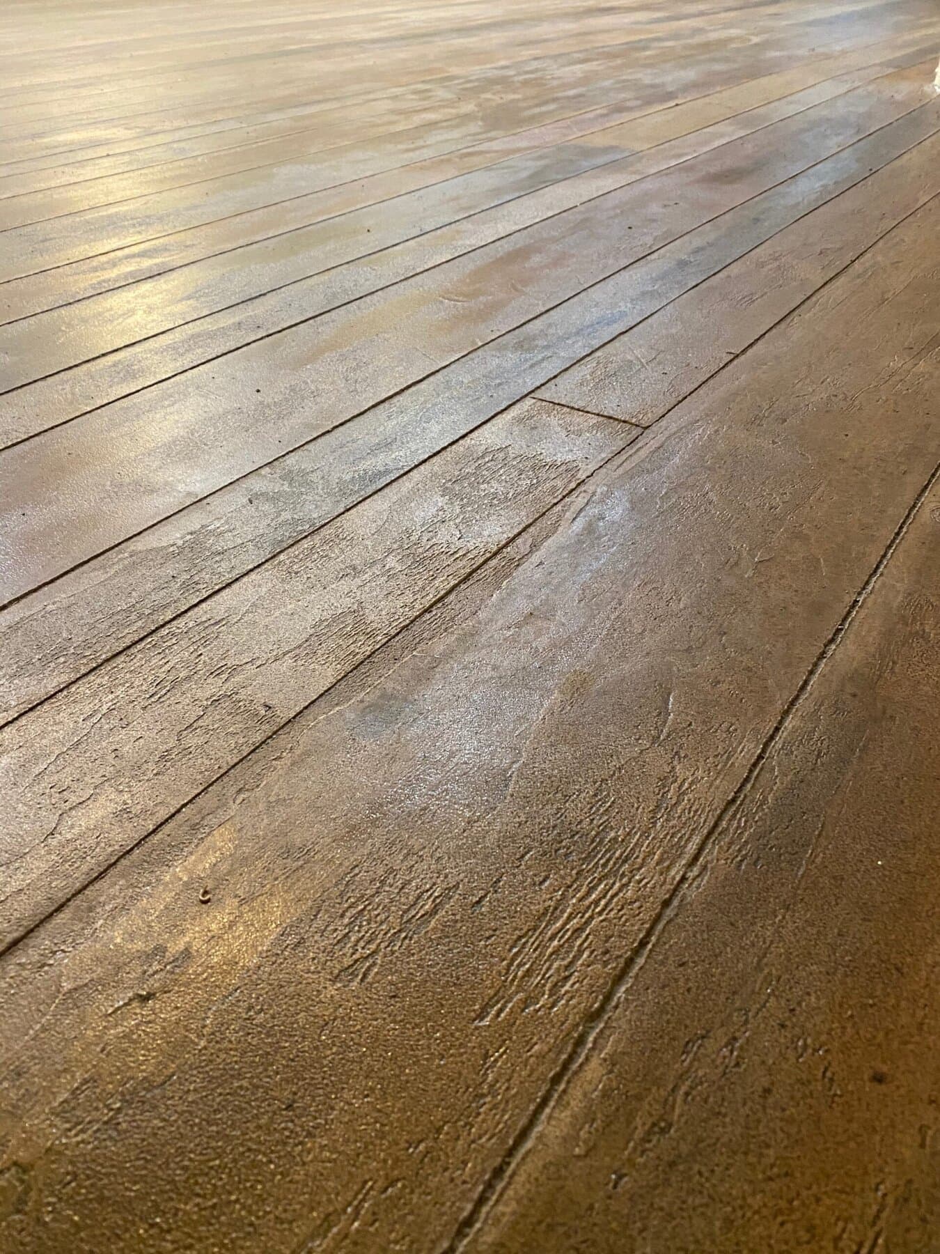 Freshly sealed wood-plank overlay
